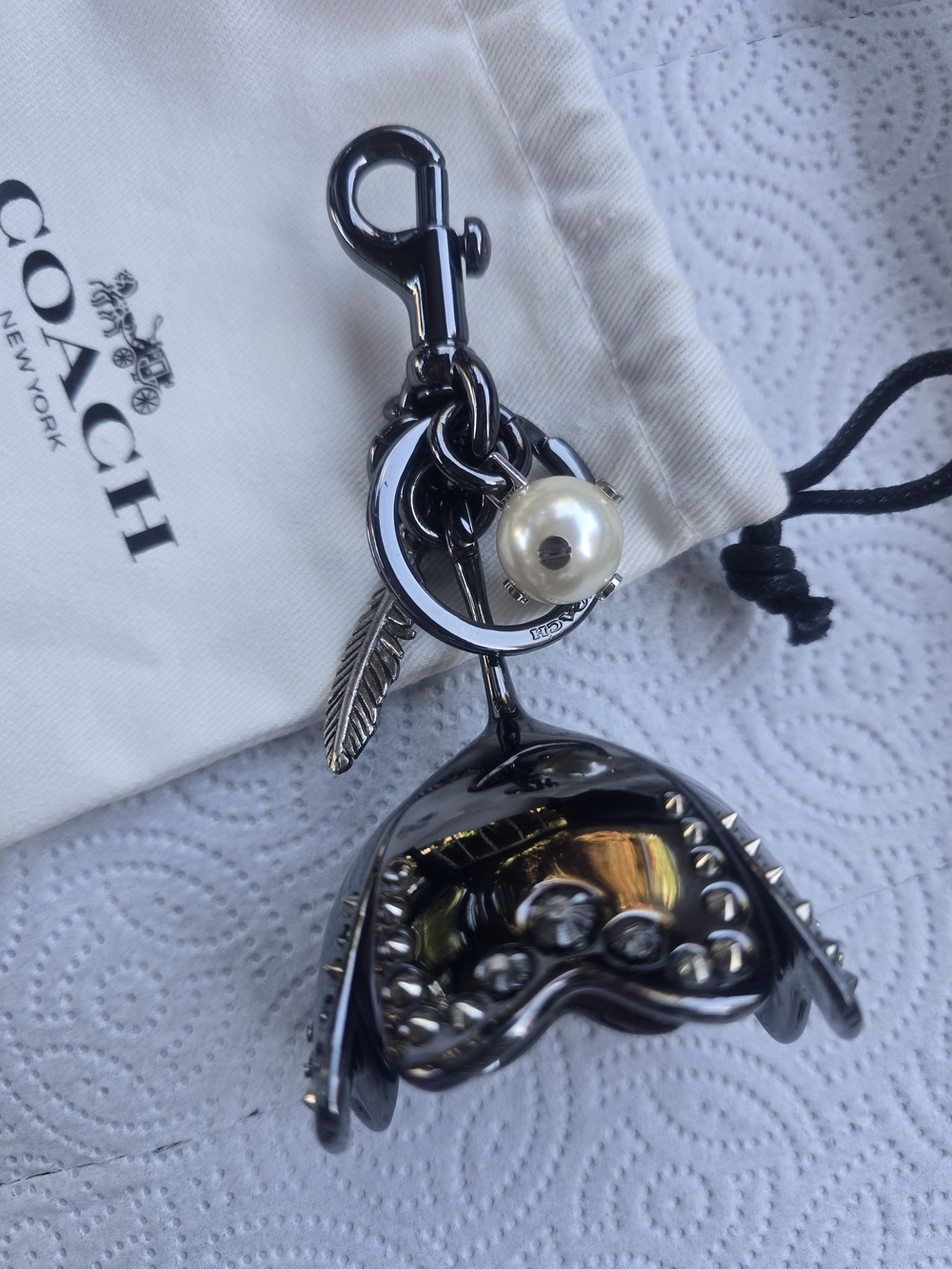 Coach Gunmetal Rose Charm Keychain with Pearl and Feather